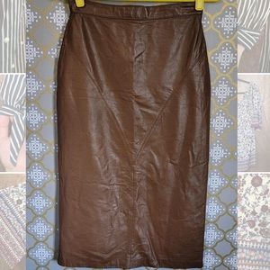 *VINTAGE* knee length leather skirt with button detail